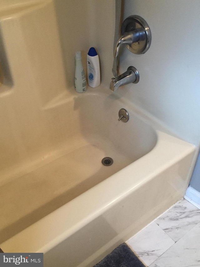 942 Monroe St, Harrisburg, PA 17113 - bathroom with marble look tile flooring