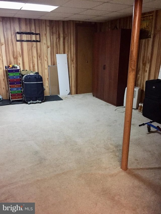 942 Monroe St, Harrisburg, PA 17113 - finished below grade area with carpet floors, wooden walls, and a drop ceiling