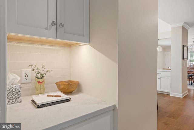 121 Eshelman Rd, Lancaster, PA 17601 - detailed view of wood finished floors, crown molding, and tasteful backsplash