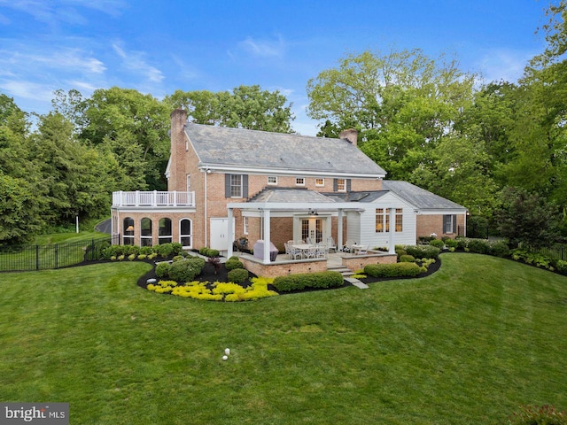 121 Eshelman Rd, Lancaster, PA 17601 - back of house with a chimney, french doors, a patio, and brick siding