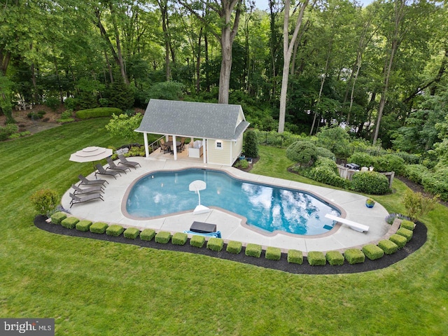 121 Eshelman Rd, Lancaster, PA 17601 - outdoor pool featuring a storage structure, an outbuilding, a patio area, and a diving board