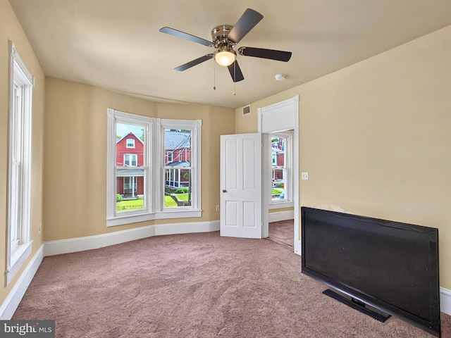 225 S State St, Ephrata, PA 17522 - carpeted empty room with baseboards, a ceiling fan, and a smoke detector