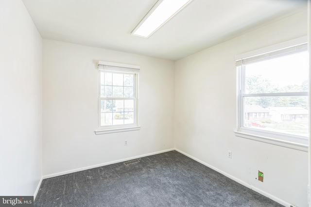 7910 Polk St, Lanham, MD 20706 - unfurnished room featuring dark carpet and baseboards