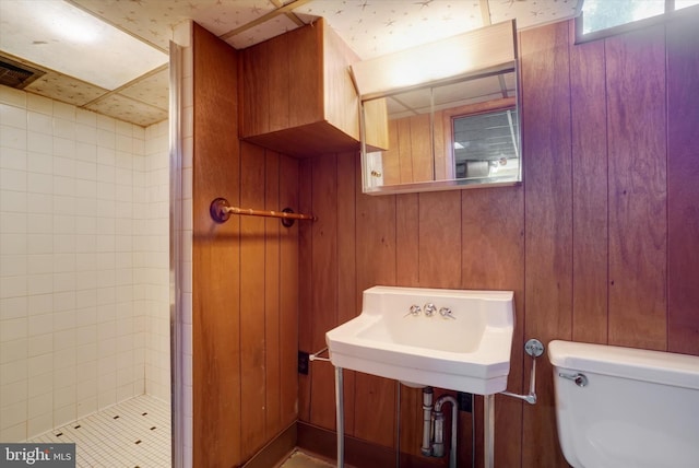 758 Rathton Rd, York, PA 17403 - full bath with toilet, a shower stall, wood walls, and a sink