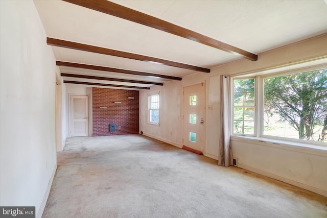 758 Rathton Rd, York, PA 17403 - spare room featuring beam ceiling, baseboards, and light carpet