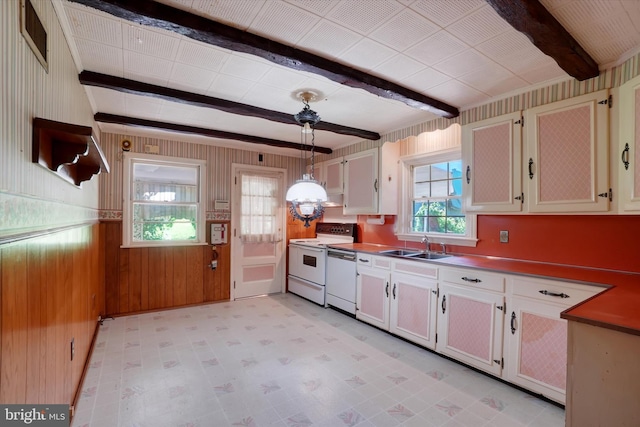 758 Rathton Rd, York, PA 17403 - kitchen with white electric range, dishwasher, beamed ceiling, light floors, and wood walls