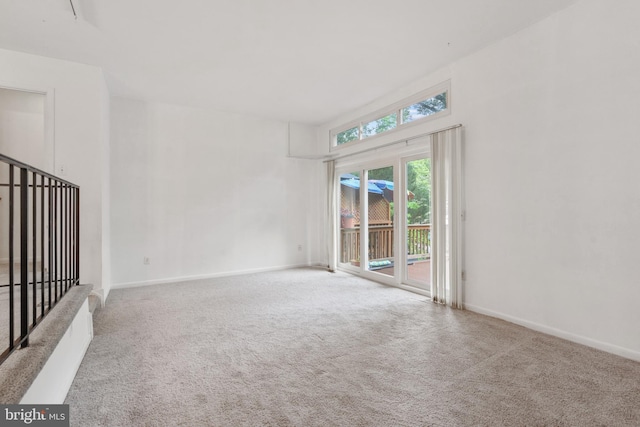2339 Millennium Ln, Reston, VA 20191 - unfurnished living room with carpet flooring and baseboards
