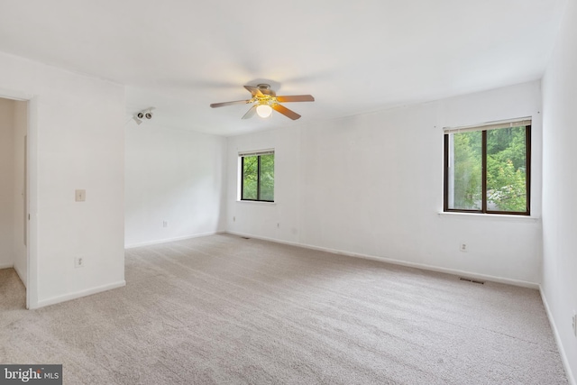 2339 Millennium Ln, Reston, VA 20191 - spare room featuring ceiling fan, light colored carpet, and baseboards