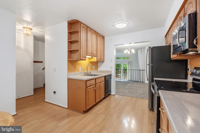 2339 Millennium Ln, Reston, VA 20191 - kitchen featuring stainless steel appliances, a sink, open shelves, light wood-type flooring, and a chandelier