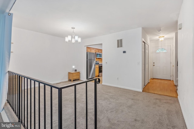 2339 Millennium Ln, Reston, VA 20191 - corridor featuring a chandelier, light colored carpet, and baseboards