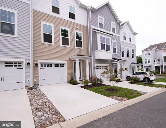 305 Shipyard Dr Unit 61, Cambridge, MD 21613 - view of property with driveway and an attached garage