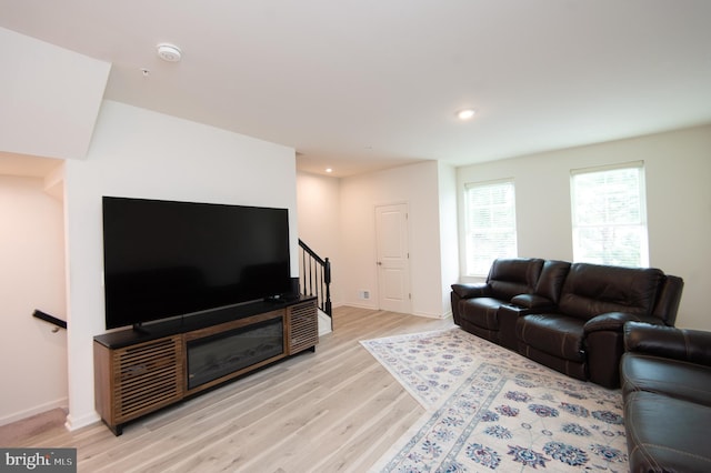 305 Shipyard Dr Unit 61, Cambridge, MD 21613 - living area featuring light wood-type flooring, stairs, baseboards, and recessed lighting