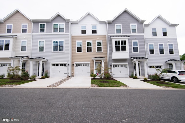 305 Shipyard Dr Unit 61, Cambridge, MD 21613 - view of property with driveway and a garage