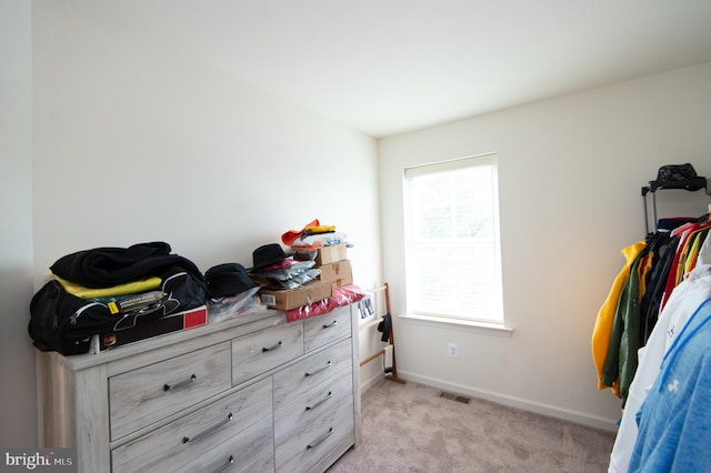 305 Shipyard Dr Unit 61, Cambridge, MD 21613 - bedroom featuring light colored carpet and baseboards