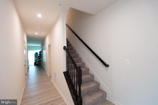 305 Shipyard Dr Unit 61, Cambridge, MD 21613 - stairway with wood finished floors, recessed lighting, and baseboards