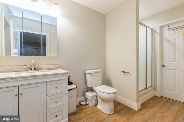 136 Chalkboard Ct, Moorestown, NJ 08057 - bathroom with wood finished floors, vanity, a stall shower, and toilet