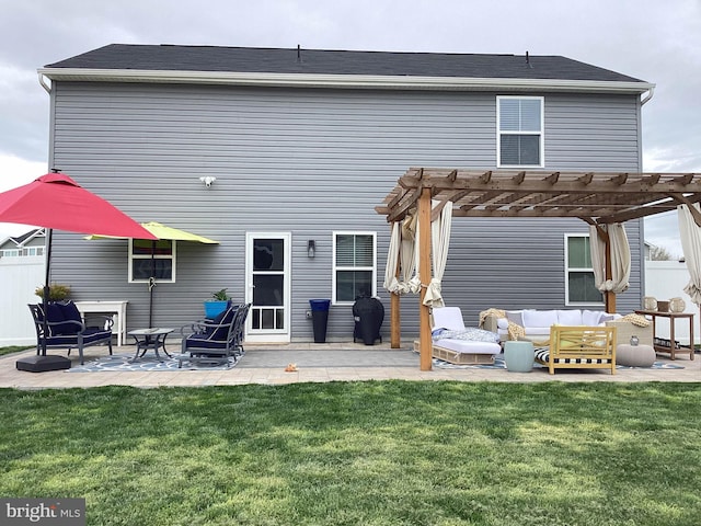 212 Bowline Dr, Cambridge, MD 21613 - rear view of property with a pergola, a patio, a yard, and an outdoor hangout area