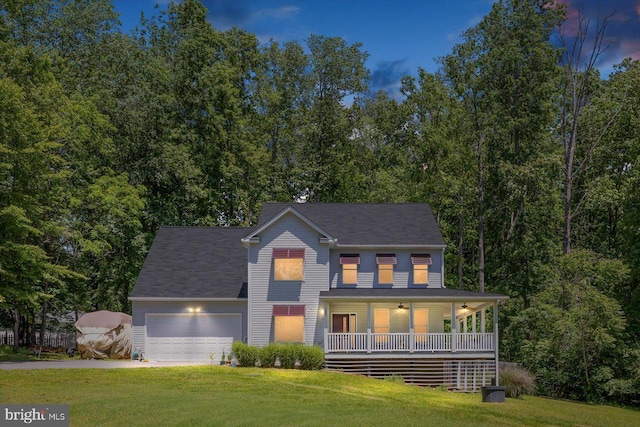 27 Athens Ln, Ruther Glen, VA 22546 - view of front of home featuring covered porch, driveway, a front yard, and an attached garage