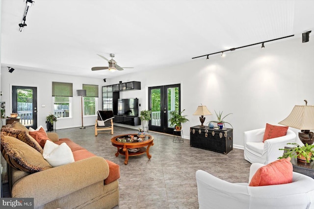 27 Athens Ln, Ruther Glen, VA 22546 - living area with track lighting, plenty of natural light, french doors, and ceiling fan
