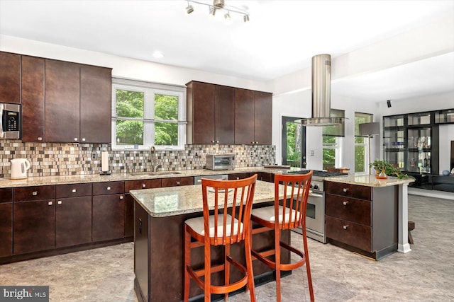 27 Athens Ln, Ruther Glen, VA 22546 - kitchen featuring a sink, island exhaust hood, a center island, healthy amount of natural light, and recessed lighting