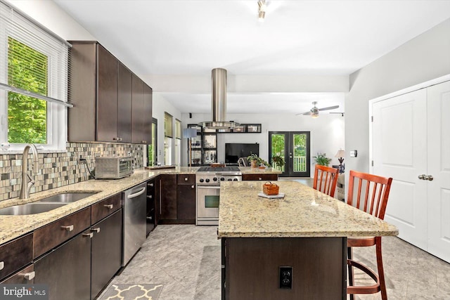 27 Athens Ln, Ruther Glen, VA 22546 - kitchen with appliances with stainless steel finishes, a sink, plenty of natural light, and a kitchen breakfast bar