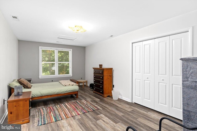 27 Athens Ln, Ruther Glen, VA 22546 - bedroom featuring wood finished floors, a closet, and baseboards