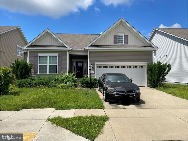 11337 Flag Ct, White Plains, MD 20695 - view of front of property with board and batten siding and driveway