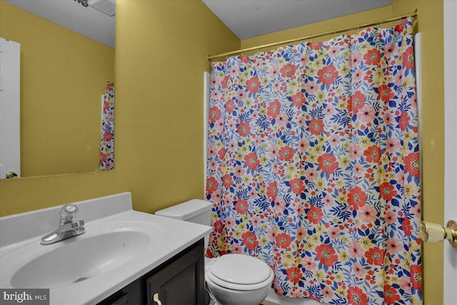 69 Calais Dr, Reading, PA 19605 - full bathroom featuring vanity, toilet, and a shower with shower curtain