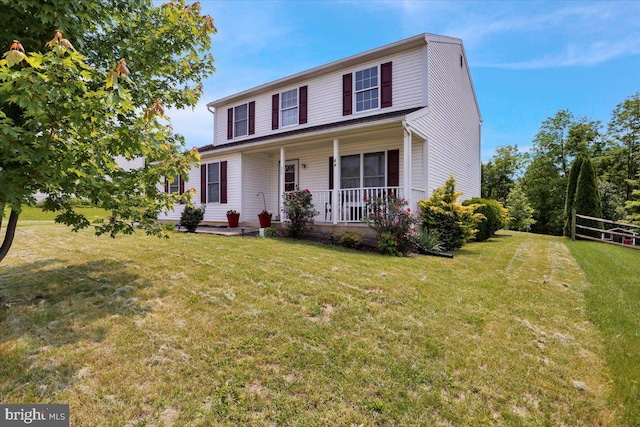 69 Calais Dr, Reading, PA 19605 - view of front of house with covered porch and a front lawn