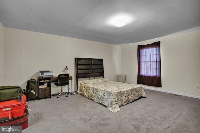 69 Calais Dr, Reading, PA 19605 - carpeted bedroom with baseboards and a desk