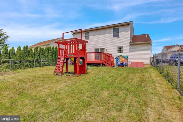 69 Calais Dr, Reading, PA 19605 - rear view of property with a deck and a playground
