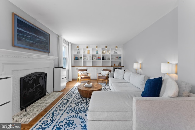 812 E Haverford Rd, Bryn Mawr, PA 19010 - living room with a fireplace and light wood finished floors