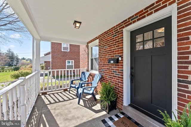 812 E Haverford Rd, Bryn Mawr, PA 19010 - entrance to property with covered porch and brick siding