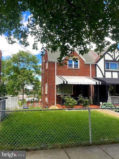3936 NE Blaine St NE, Washington, DC 20019 - tudor-style house with brick siding