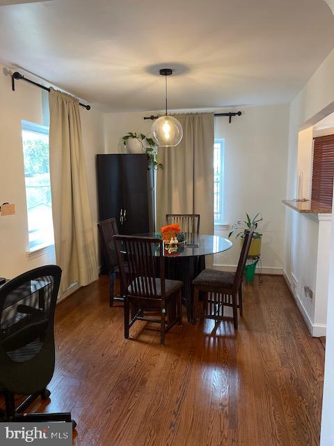 3936 NE Blaine St NE, Washington, DC 20019 - dining area featuring healthy amount of natural light and wood finished floors