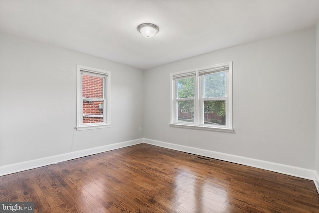 509 W Cork St, Winchester, VA 22601 - empty room featuring dark wood finished floors and baseboards