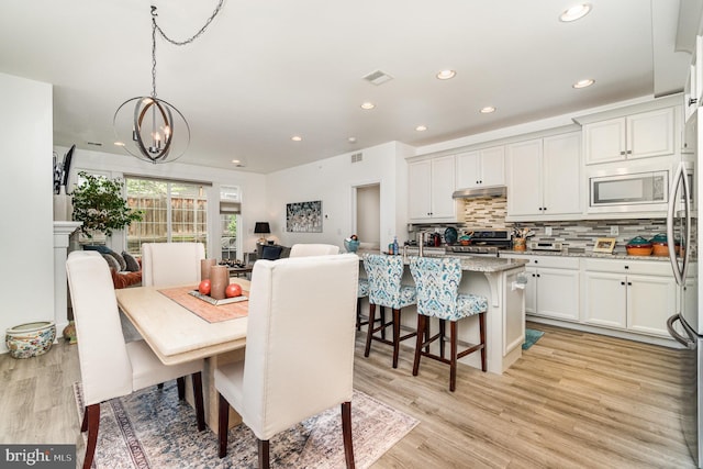 3209 Haley Way, Mechanicsburg, PA 17055 - dining area featuring a chandelier, light wood-style floors, and recessed lighting