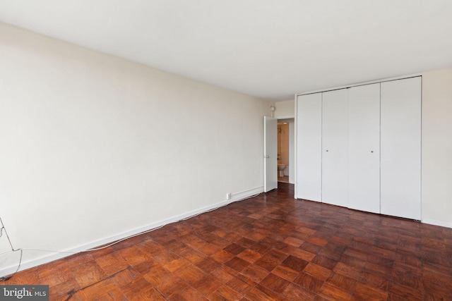 210 Locust St Unit 21Dw, Philadelphia, PA 19106 - unfurnished bedroom featuring a closet and baseboards