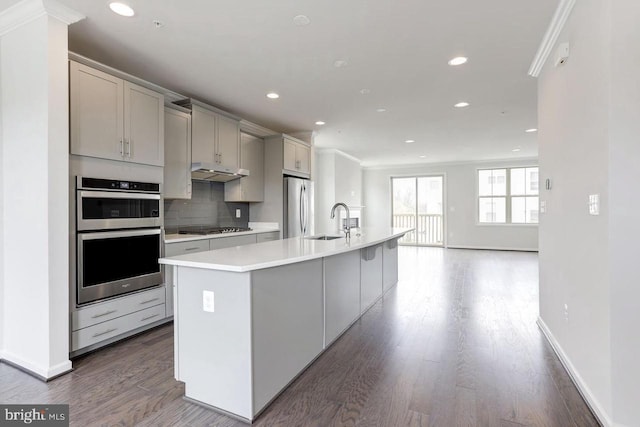 11 Blue Jay Way, Clarksburg, MD 20871 - kitchen with appliances with stainless steel finishes, a sink, ornamental molding, light countertops, and gray cabinets