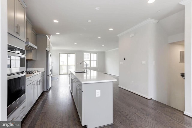 11 Blue Jay Way, Clarksburg, MD 20871 - kitchen featuring stainless steel appliances, gray cabinetry, crown molding, light countertops, and recessed lighting