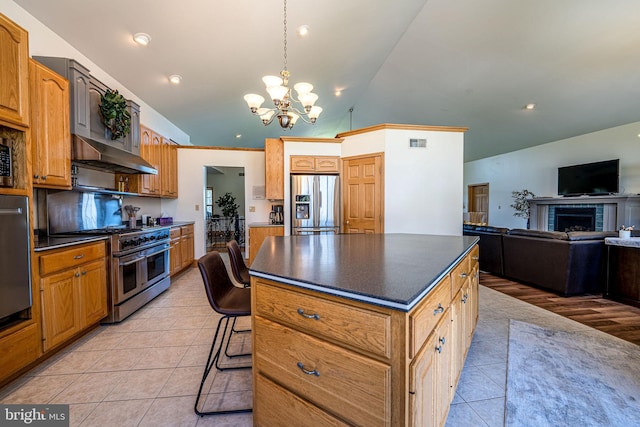 1874 Roundtop Rd, Wellsboro, PA 16901 - kitchen with stainless steel appliances, dark countertops, light tile patterned floors, a chandelier, and high vaulted ceiling