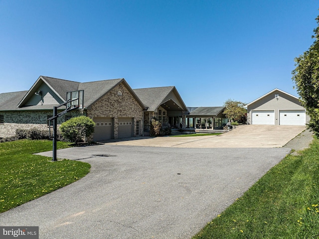 1874 Roundtop Rd, Wellsboro, PA 16901 - view of front of house with stone siding and a front yard