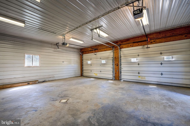1874 Roundtop Rd, Wellsboro, PA 16901 - garage featuring a garage door opener