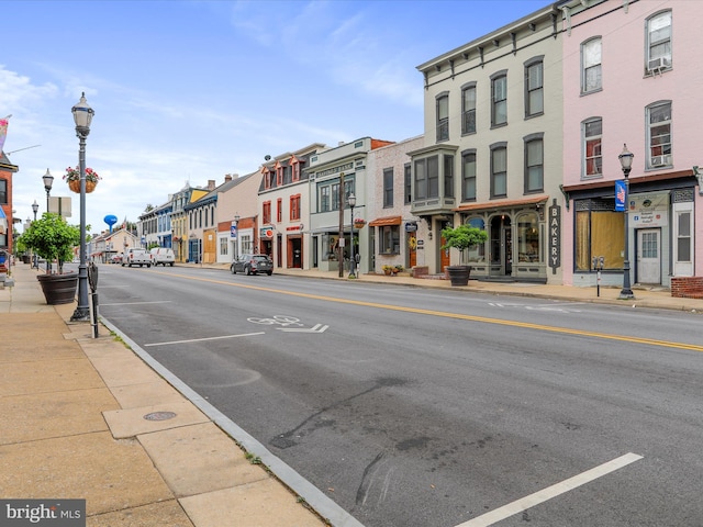 25 E Potomac St, Williamsport, MD 21795 - view of asphalt street with street lighting, sidewalks, curbs, and a residential view