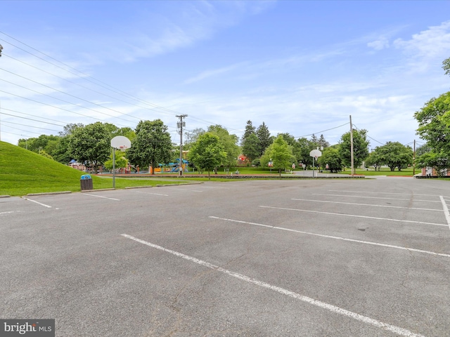 25 E Potomac St, Williamsport, MD 21795 - uncovered parking lot with community basketball court