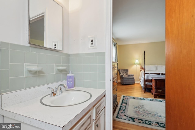 140 Ardmore Ave, Haddonfield, NJ 08033 - bathroom featuring vanity, ensuite bath, and wood finished floors