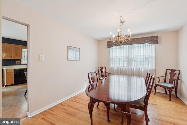 140 Ardmore Ave, Haddonfield, NJ 08033 - dining area with plenty of natural light, a chandelier, light wood-style flooring, and baseboards