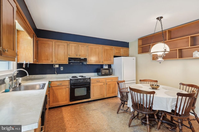 140 Ardmore Ave, Haddonfield, NJ 08033 - kitchen with black appliances, a sink, under cabinet range hood, and light countertops