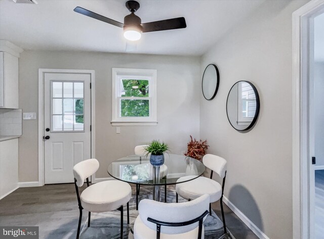 6985 Old Harrisburg Rd, York Springs, PA 17372 - dining room with baseboards, wood finished floors, and a ceiling fan