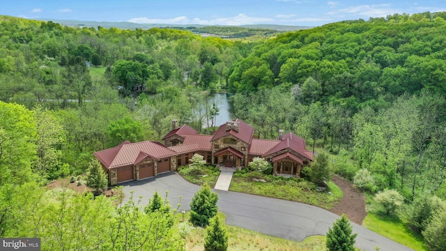 2042 Folk Rd, Fogelsville, PA 18051 - aerial view of property and surrounding area with a heavily wooded area